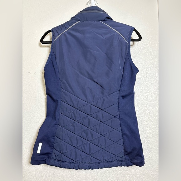 Zella Coco Hybrid Zelfusion Puffer
Vest. Navy Sleeveless Fleece Moisture Wicking - Picture 13 of 14